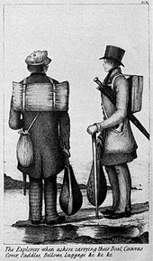 Два человека, несущие деревянные палки. На одного надёт маленький рюкзак, другой несёт большой свёрнутый зонт.