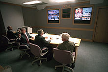 President George W. Bush conduct a video tele-conference at Offutt Air Force Base.jpg