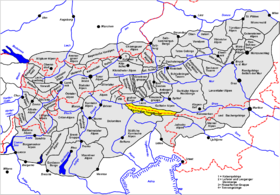 Восточные Альпы выделены серым цветом, жёлтым цветом показаны Карнийские Альпы.